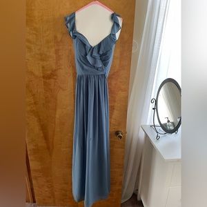 Bridesmaid dress. Not hemmed. Bust was altered